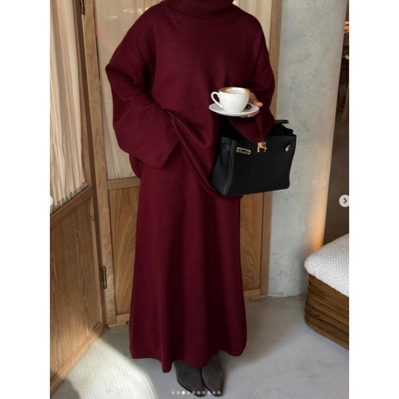 Women's knit dress with high collar and wide silhouette NOVAE