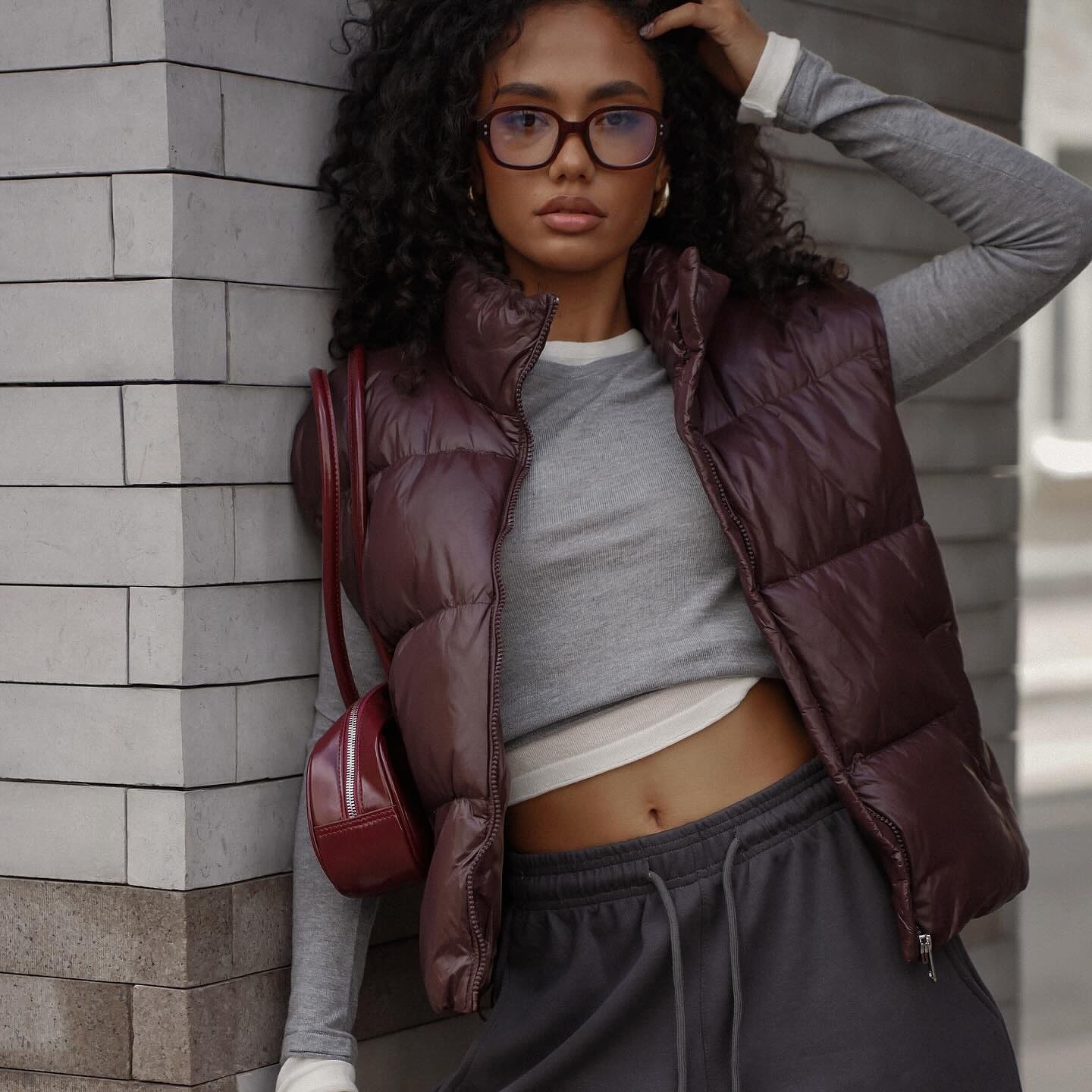 Women's quilted vest with high collar and practical zipper NOVAE