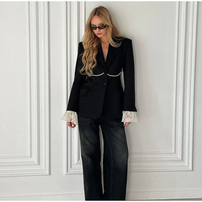 Women's elegant blazer jacket with a relaxed fit and striking sleeves NOVAE