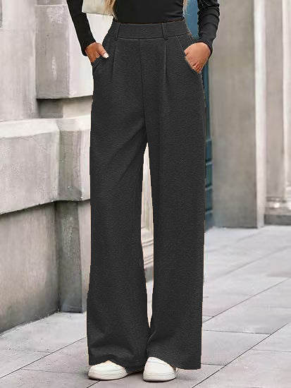 Women's wide-leg trousers with a high waistband and practical side pockets NOVAE