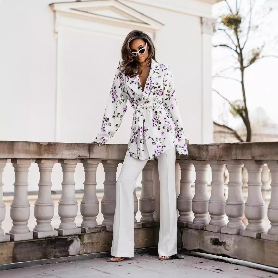 Women's wrap blouse with elegant leopard print and long puff sleeves NOVAE