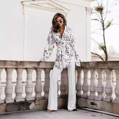 Women's wrap blouse with elegant leopard print and long puff sleeves NOVAE