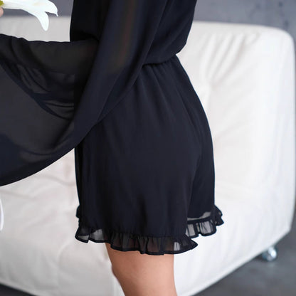 Women's elegant jumpsuit with ruffle details and button-closing V-neck NOVAE