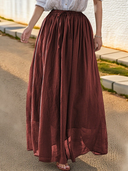 Women's elegant maxi skirt with a flowing cut and practical tie straps NOVAE