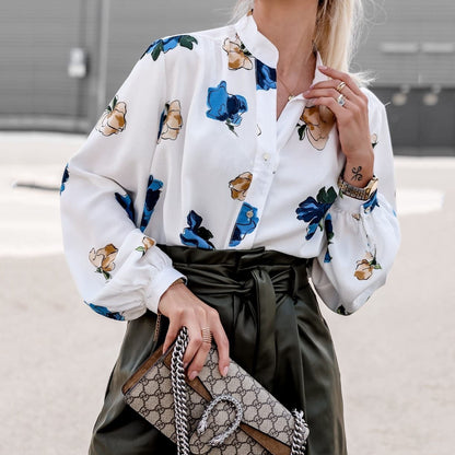 Women's elegant blouse with floral pattern and striking puff sleeves NOVAE