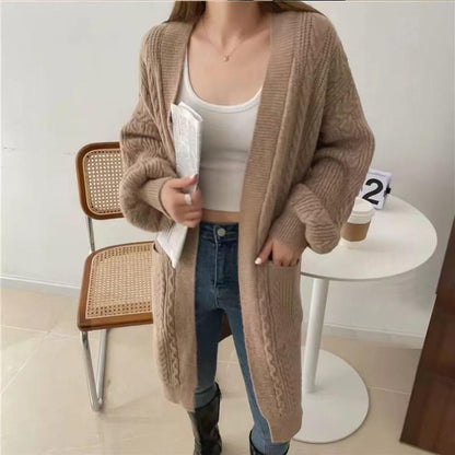 Women's chunky knit cardigan with deep pockets and elegant cable design NOVAE