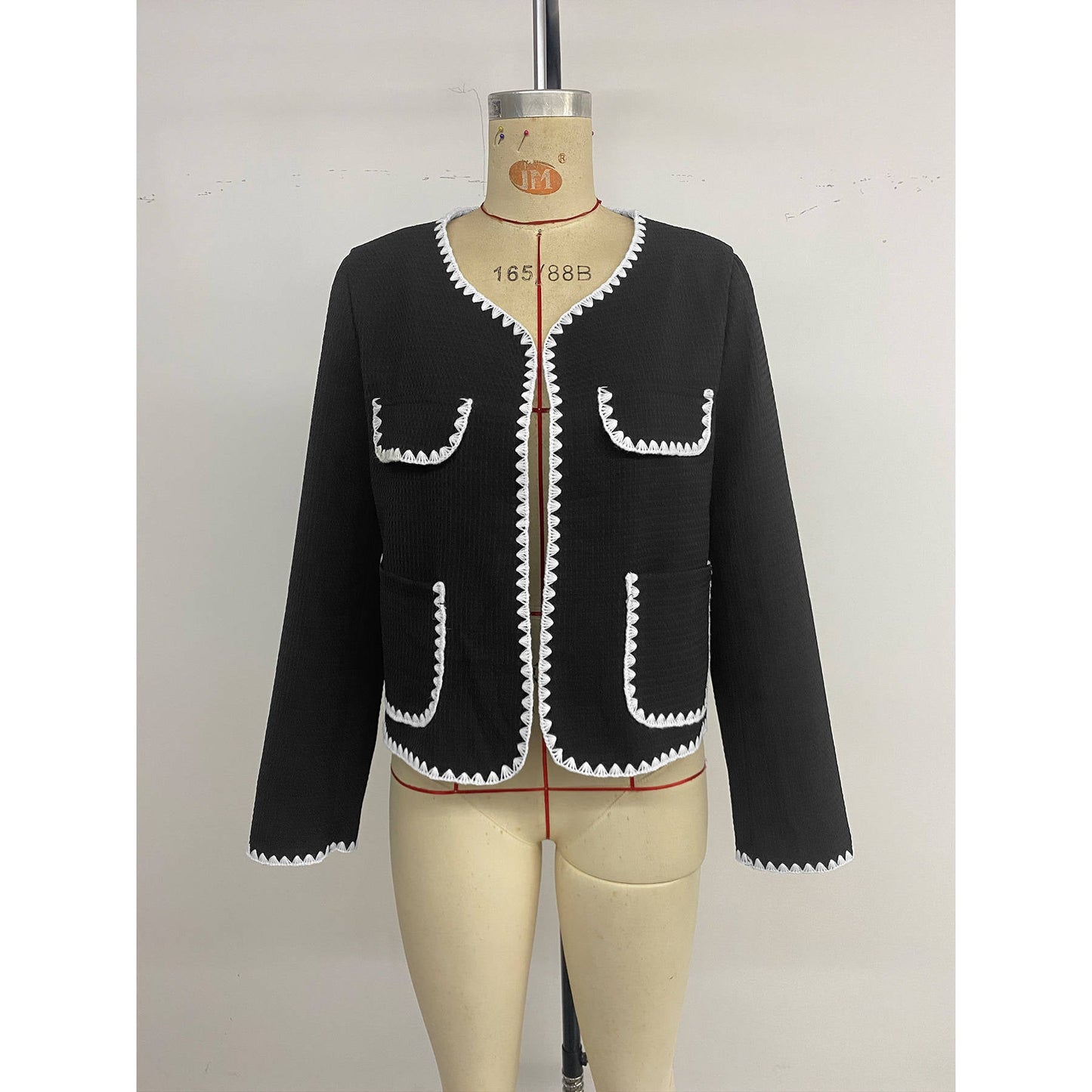 Women's elegant short-sleeved blazer jacket with contrasting piping details and pockets NOVAE