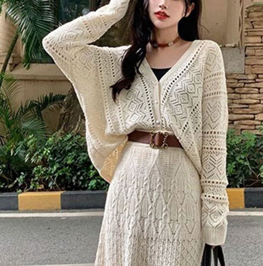 Women's knit dress with fine openwork pattern and elegant button details NOVAE