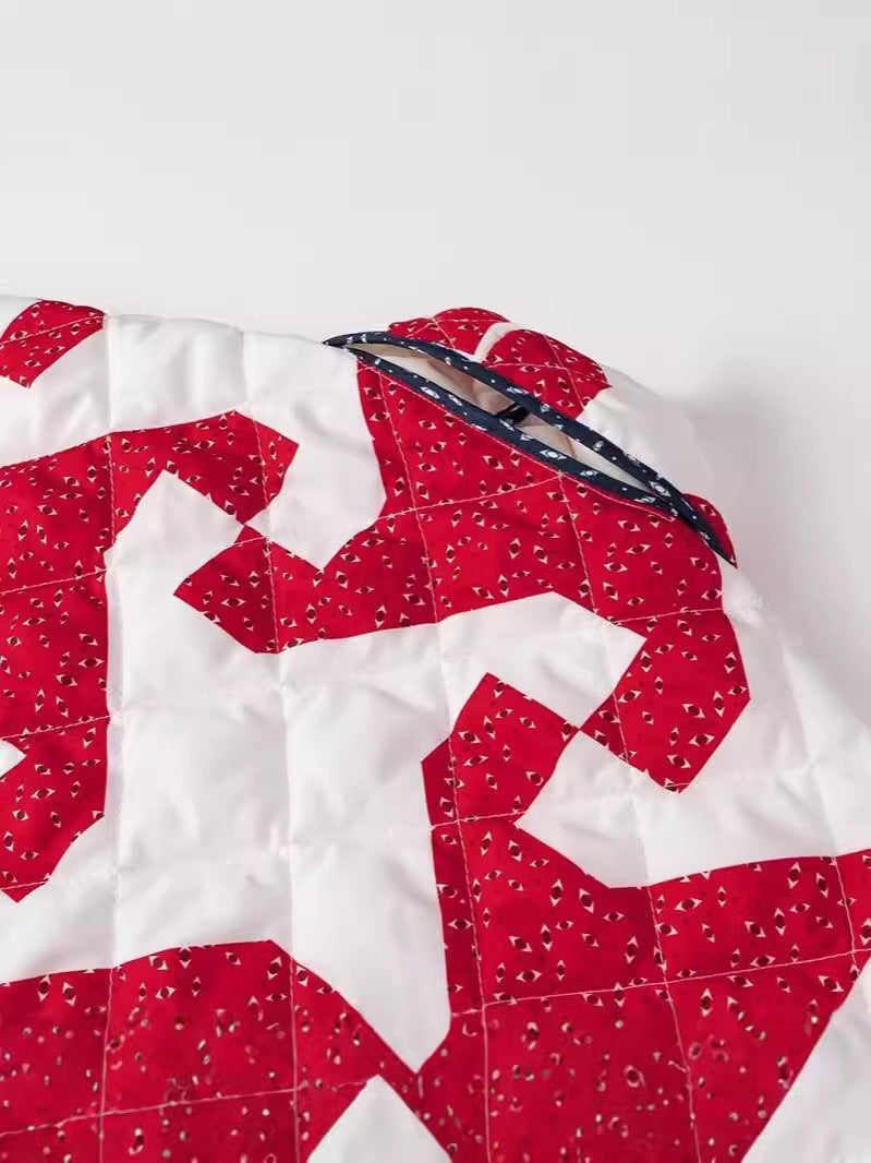 Women's quilted throw jacket with modern graphic design and generous pockets NOVAE