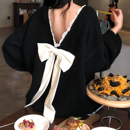 Women's Oversized Knit Sweater with V-Neck and Delicate Lace Trim NOVAE