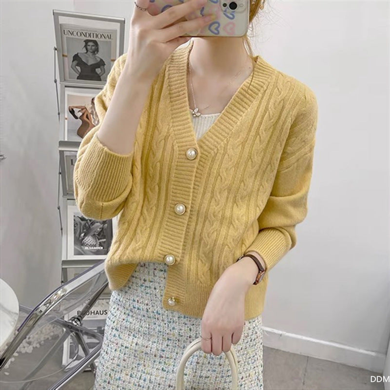 Women's cardigan with elegant cable knit pattern and high-quality button details NOVAE