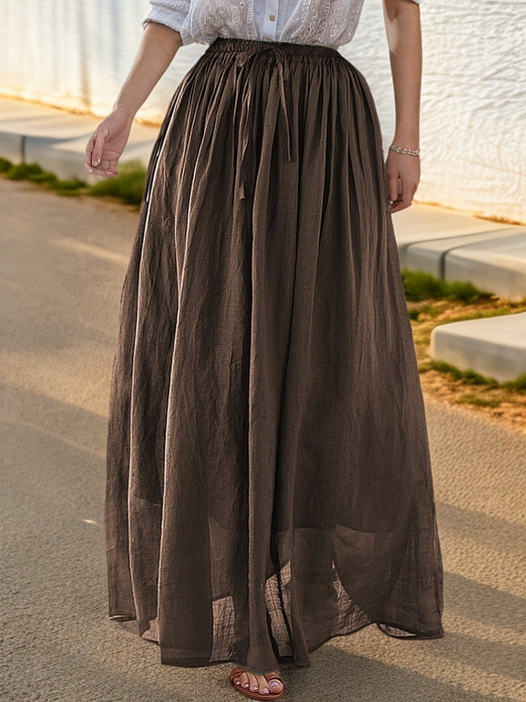 Women's elegant maxi skirt with a flowing cut and practical tie straps NOVAE
