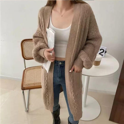 Women's chunky knit cardigan with deep pockets and elegant cable design NOVAE