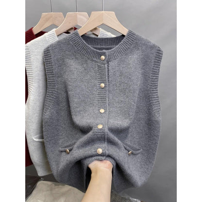 Women's knitted vest with button details and side pockets NOVAE