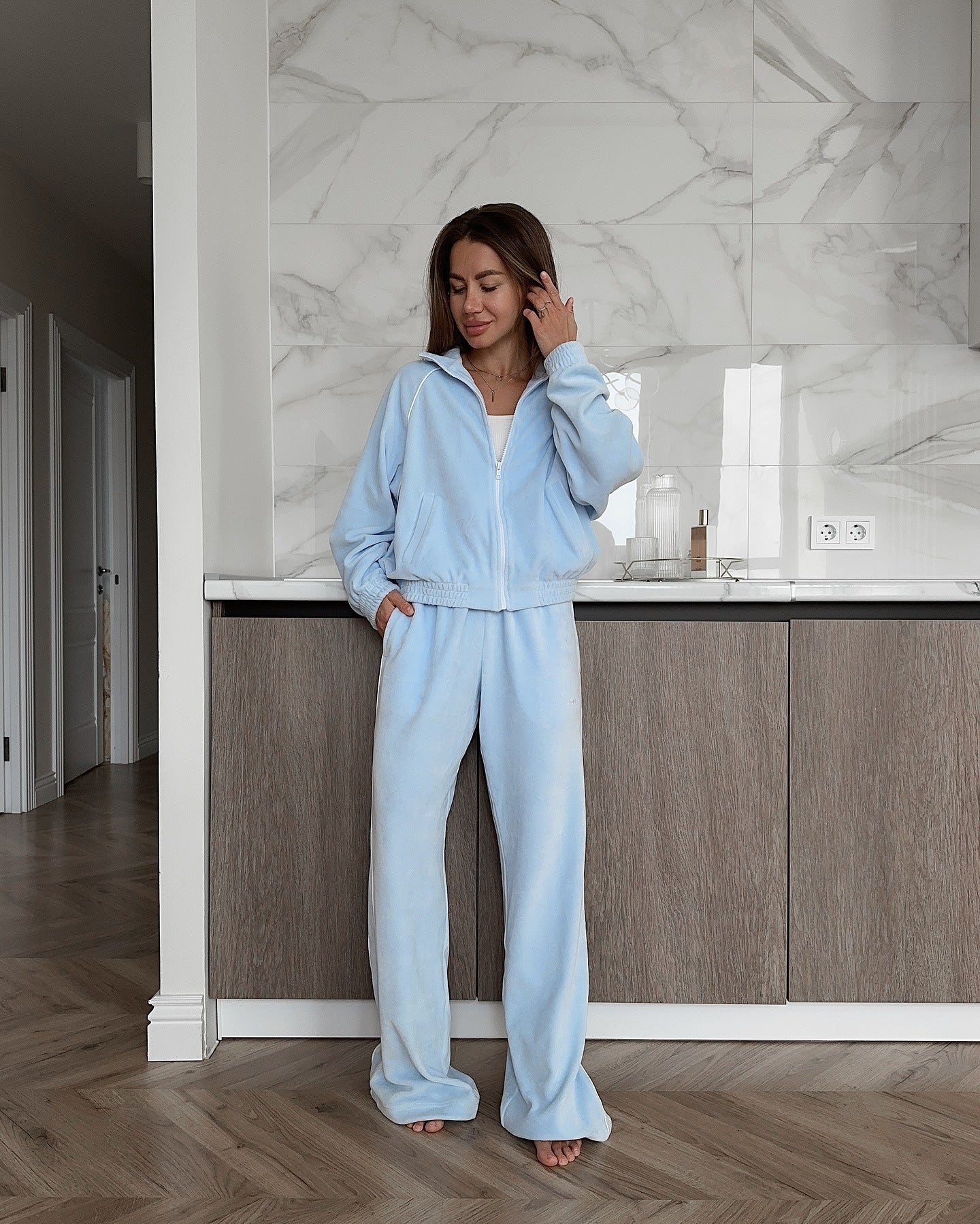 Women's leisure suit made of soft fleece with a high collar and practical pockets NOVAE
