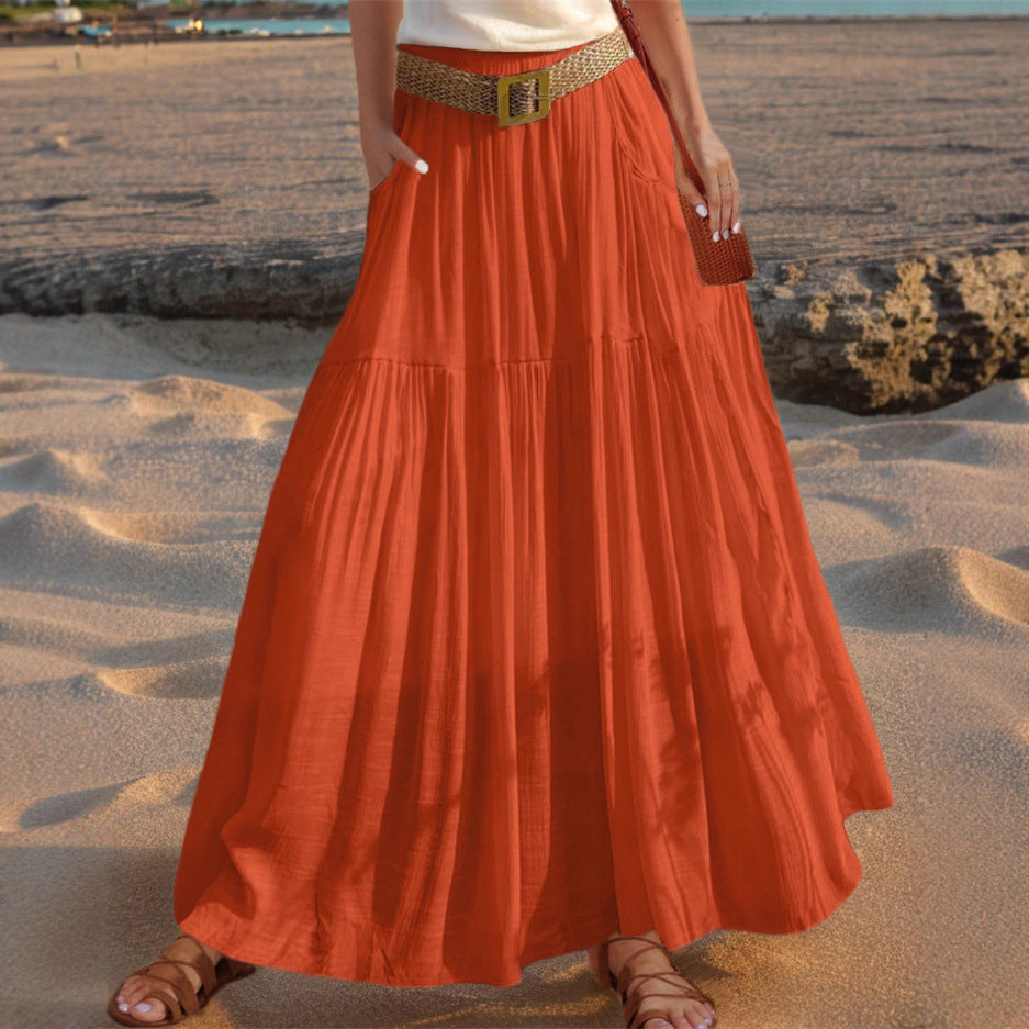 Women's wide-flared maxi skirt with elegant pleats and practical pockets NOVAE