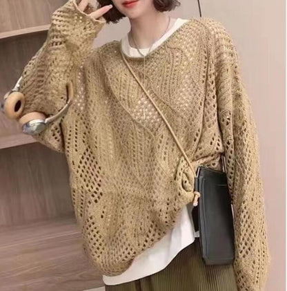 Women's chunky knit sweater with innovative openwork pattern and relaxed fit NOVAE