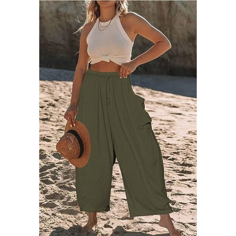 Women's wide and comfortable summer trousers with elasticated waistband and practical pockets NOVAE
