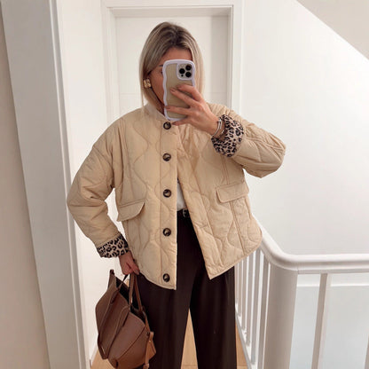 Women's quilted transitional jacket with practical pockets and round neckline NOVAE