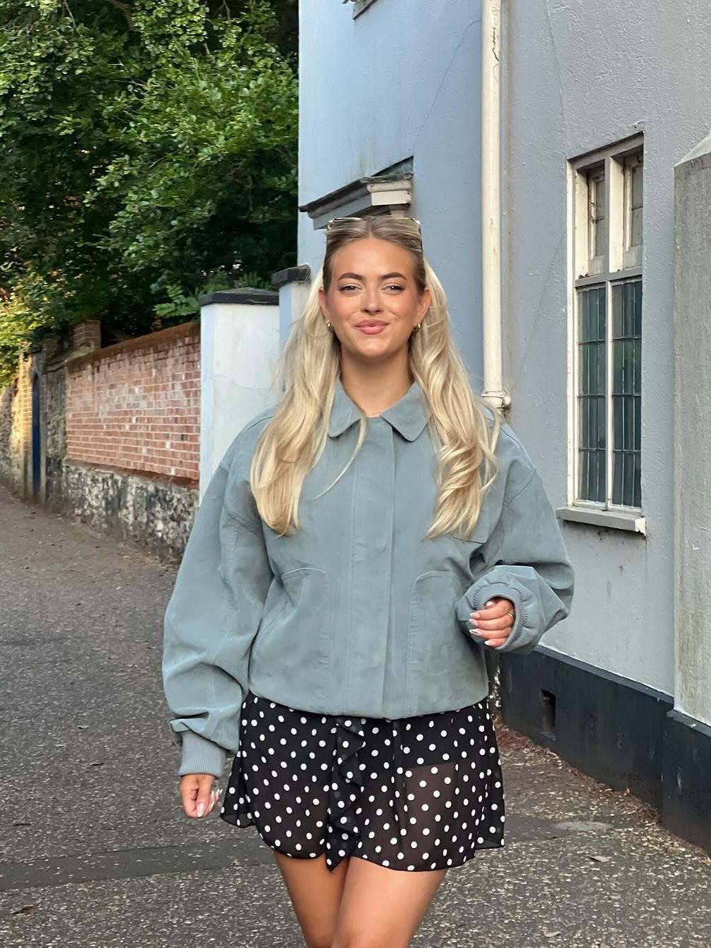 Women's short bomber jacket made of soft material with a casual cut NOVAE