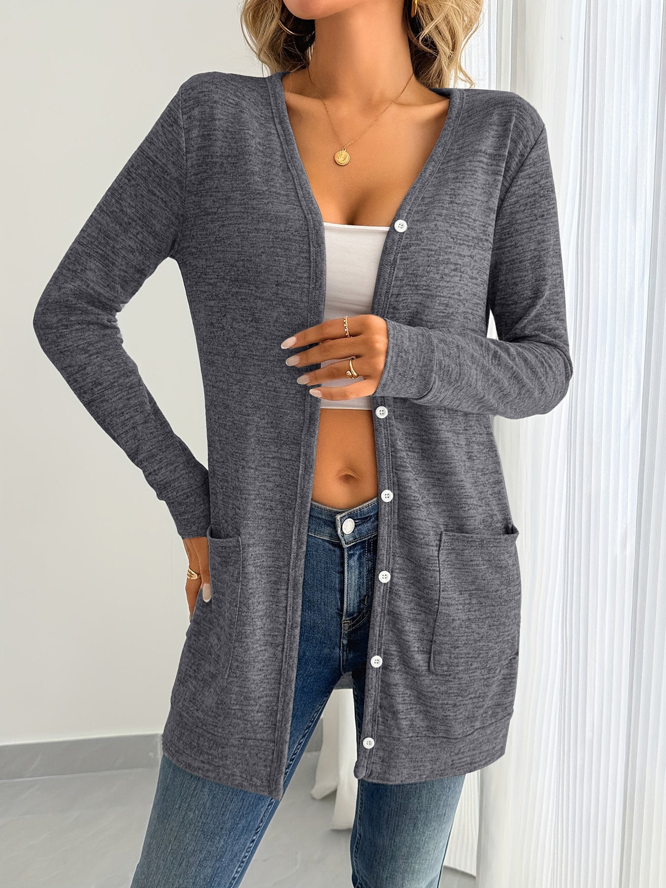 Women's long-sleeved cardigan with practical pockets and button placket NOVAE
