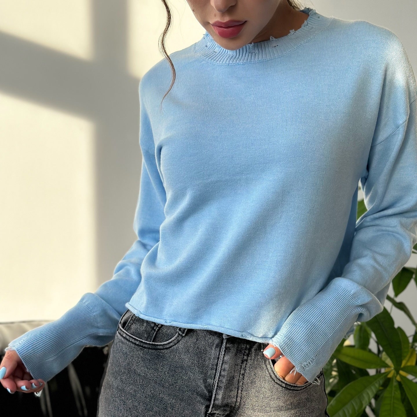Women's casual sweater with a modern ribbed collar and trendy rip details NOVAE