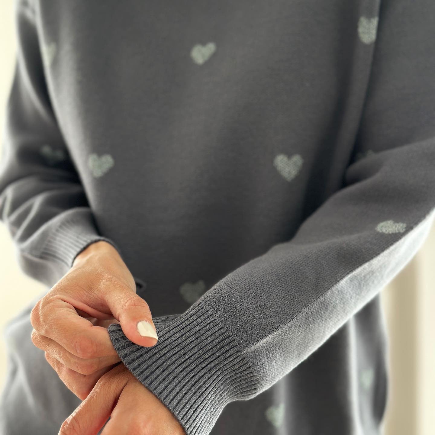 Women's autumnal knit sweater with heart pattern and comfortable cut NOVAE