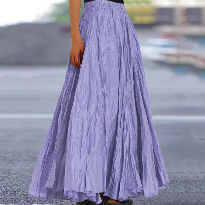 Women's long, flowing skirt with elastic waistband and modern texture NOVAE