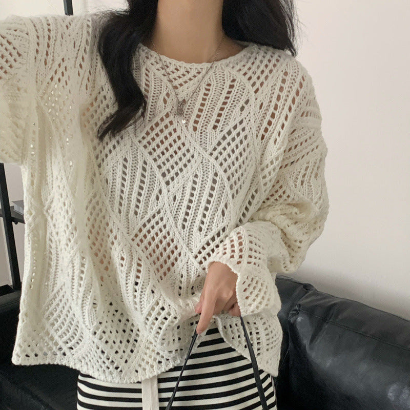 Women's chunky knit sweater with innovative openwork pattern and relaxed fit NOVAE
