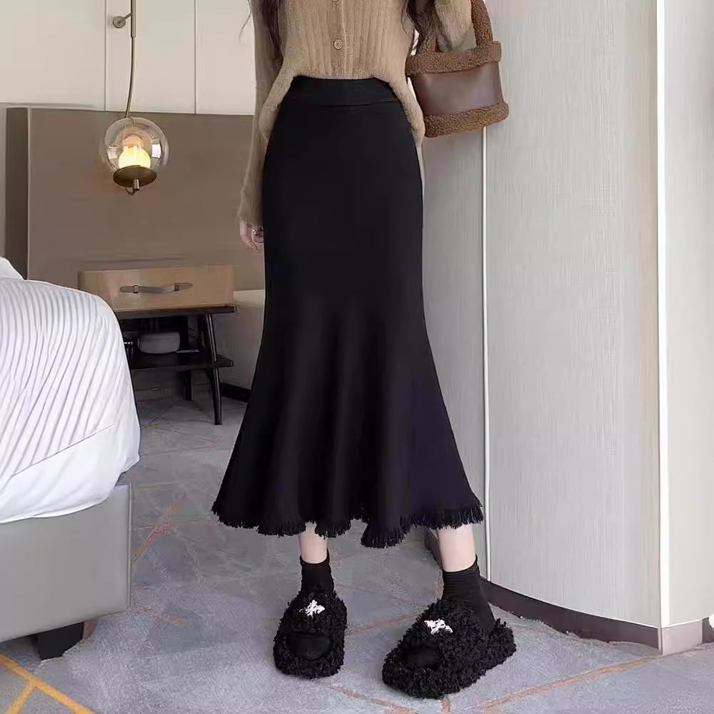 Women's elegant maxi skirt with voluminous hem and fringed details NOVAE