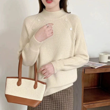 Women's chunky knit sweater with modern stand-up collar and button details NOVAE