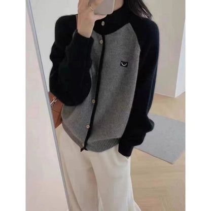 Women's knitted cardigan with elegant collar and button details NOVAE