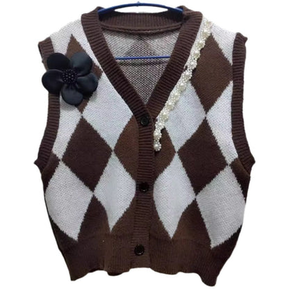 Women's knitted vest with a modern diamond pattern and elegant button detail NOVAE
