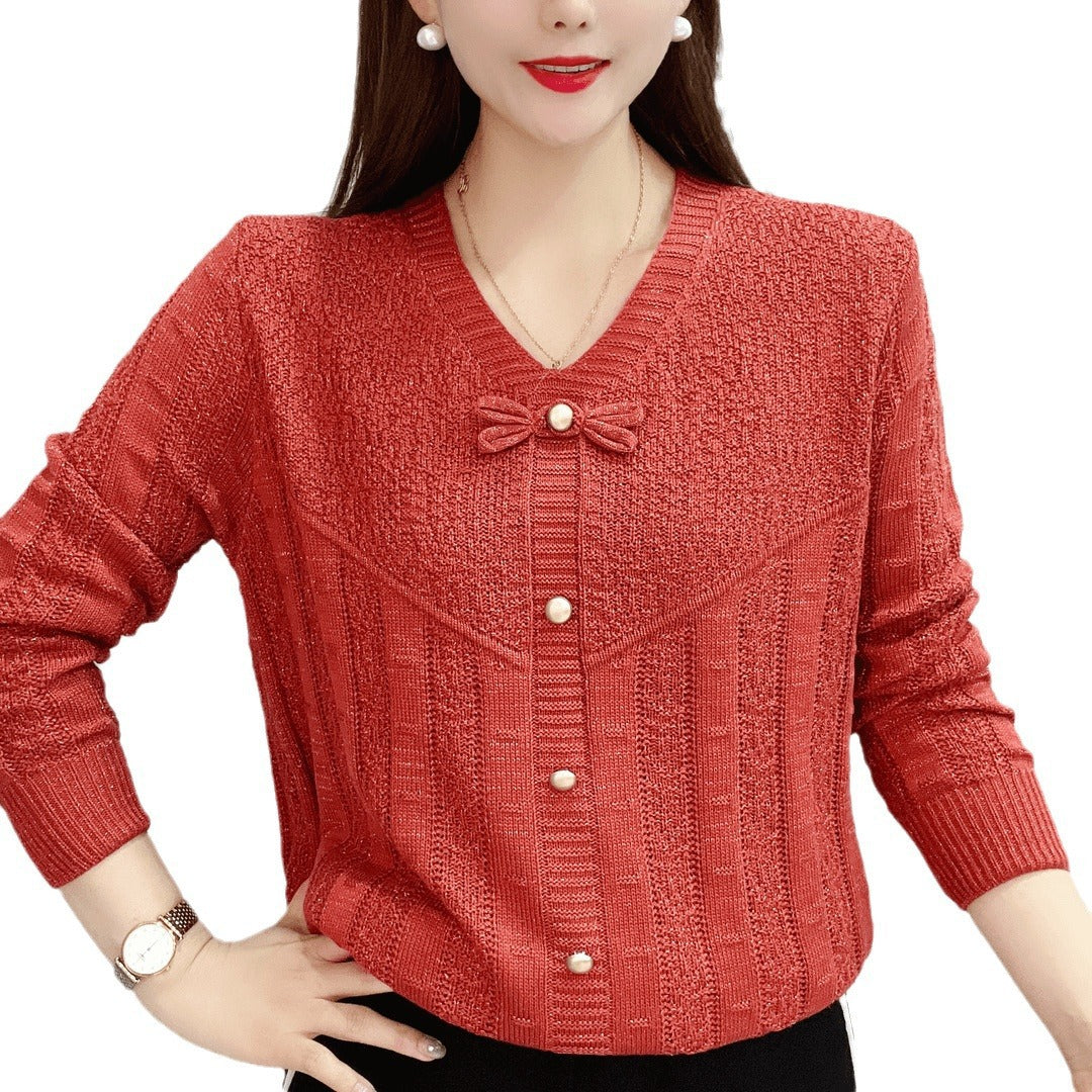 Women's knitted top with decorative pearl buttons and sophisticated bow design NOVAE