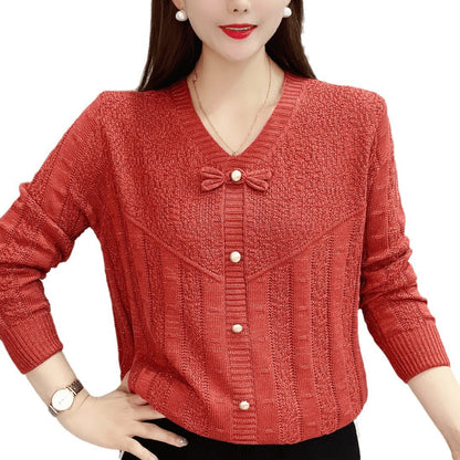 Women's knitted top with decorative pearl buttons and sophisticated bow design NOVAE