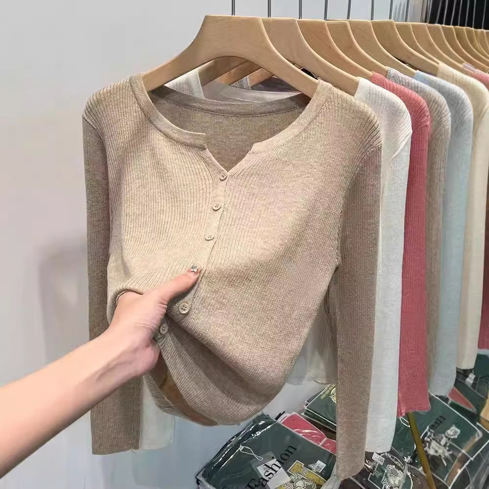 Women's figure-hugging cardigan with elegant button closure and fine ribbed texture NOVAE