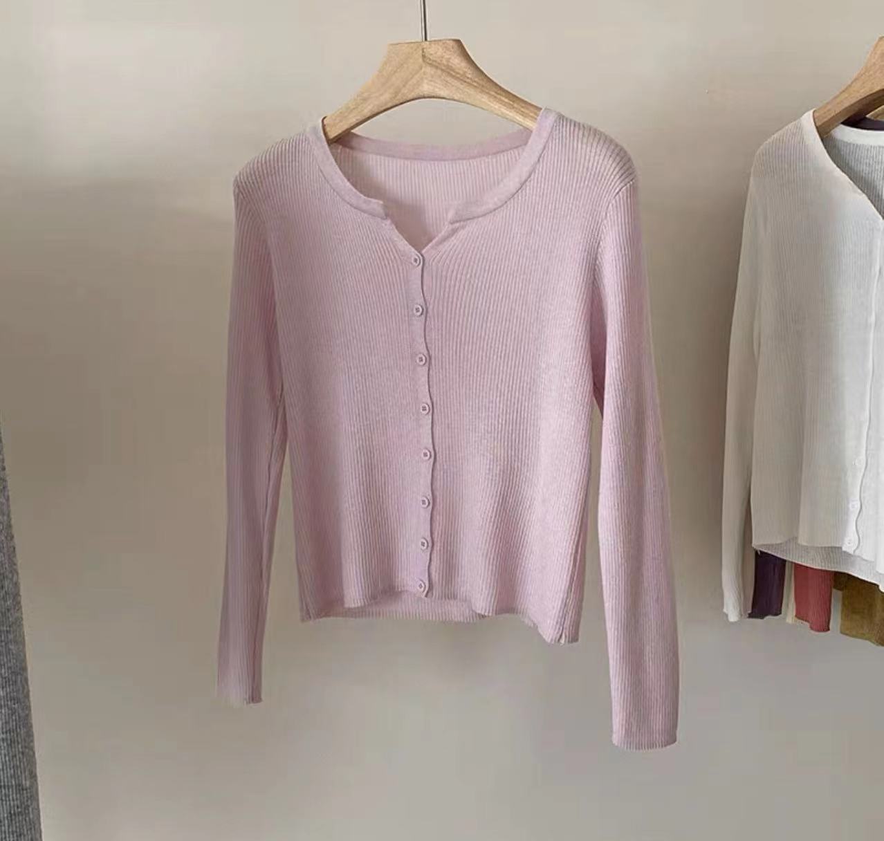 Women's figure-hugging cardigan with elegant button closure and fine ribbed texture NOVAE