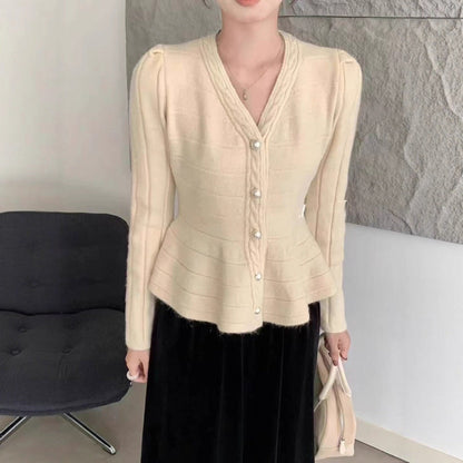 Women's elegant cardigan with structured design and feminine puff sleeves NOVAE
