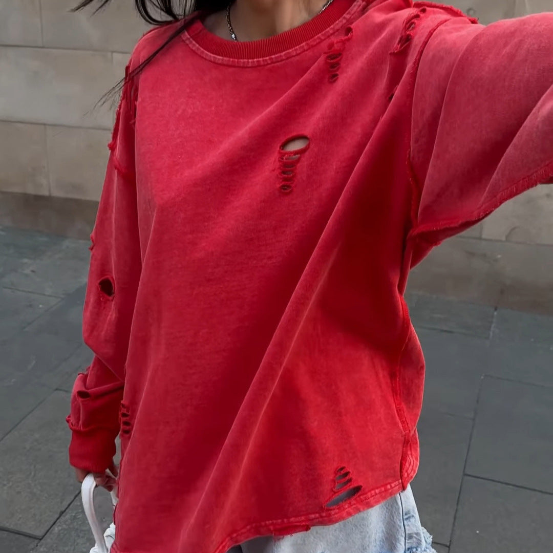 Women's casual oversized sweater with creative ripped details NOVAE