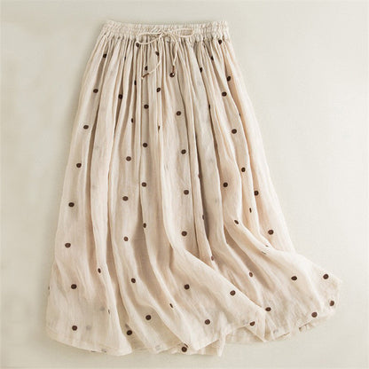 Women's long, airy skirt with elastic waistband and polka dot design NOVAE