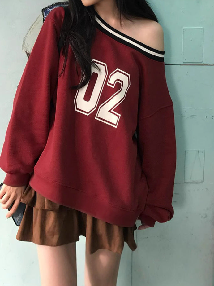 Women's casual oversized sweater with sporty print NOVAE