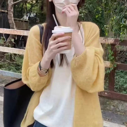 Women's fluffy cardigan with a relaxed fit and soft sleeves NOVAE