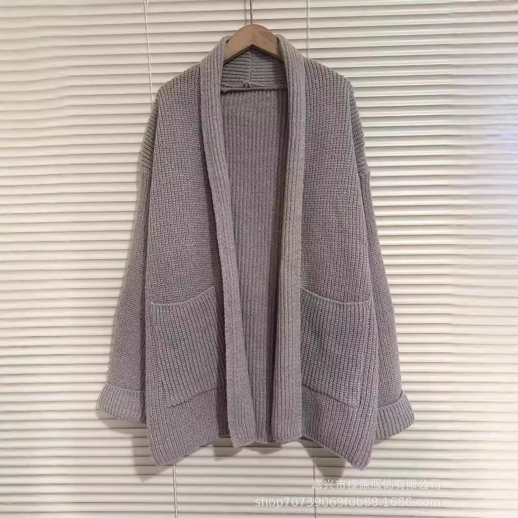 Women's chunky knit cardigan with elegant lapels and waist belt NOVAE