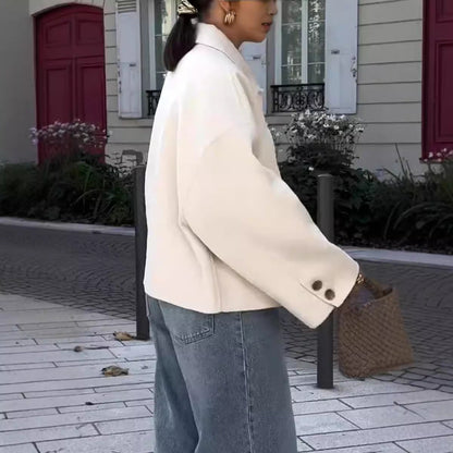 Women's fashionable oversized wool jacket with button details and a wide cut NOVAE