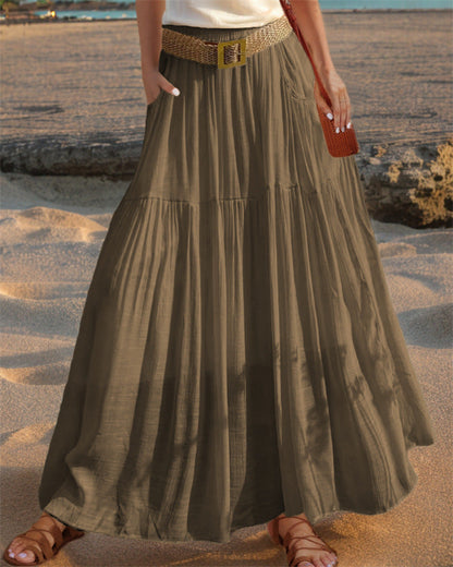 Women's wide-flared maxi skirt with elegant pleats and practical pockets NOVAE