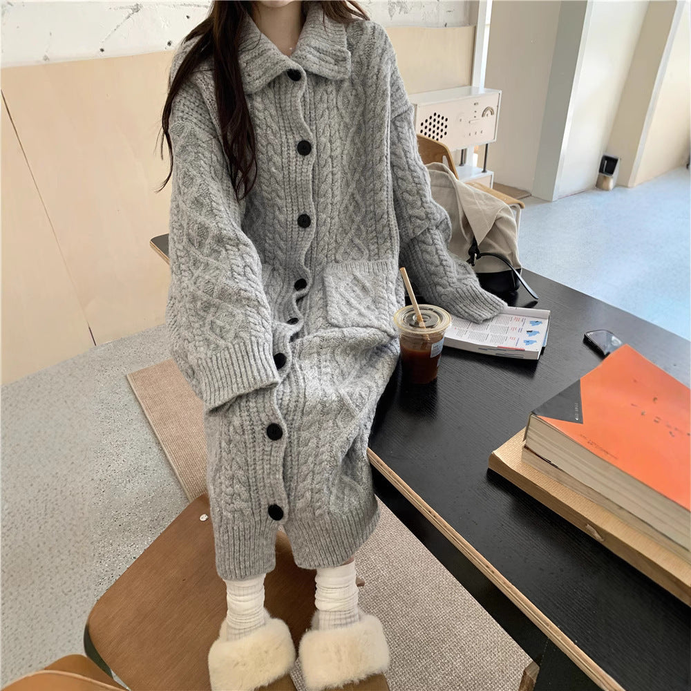 Women's chunky knit button-up coat with elegant cable pattern and practical pockets NOVAE