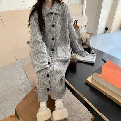 Women's chunky knit button-up coat with elegant cable pattern and practical pockets NOVAE