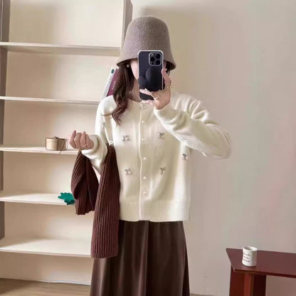 Women's cardigan with floral embroidery and pearl buttons NOVAE