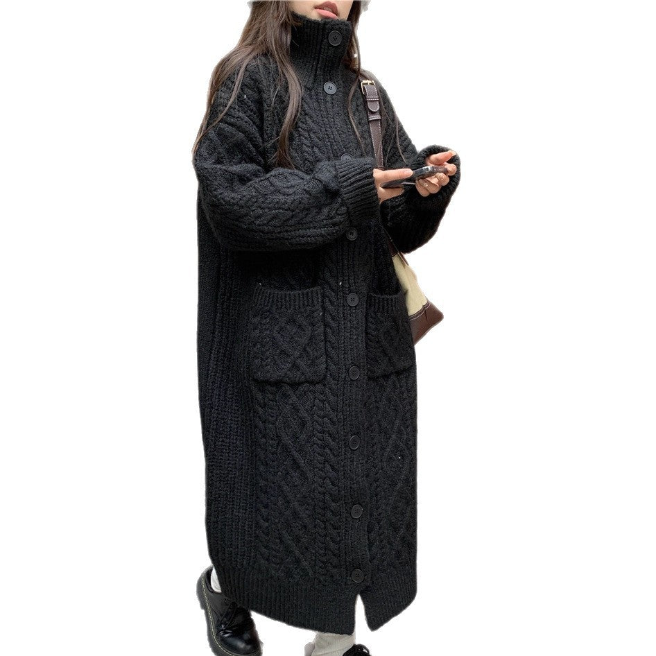Women's chunky knit button-up coat with elegant cable pattern and practical pockets NOVAE