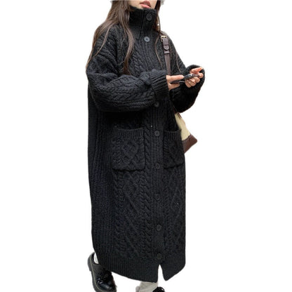 Women's chunky knit button-up coat with elegant cable pattern and practical pockets NOVAE